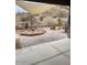 Covered patio with brick flooring and desert views at 4943 S Las Mananitas Trl, Gold Canyon, AZ 85118