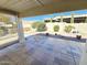 Relaxing backyard patio with a view of desert landscaping at 5830 E Mckellips Rd # 52, Mesa, AZ 85215