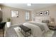 Relaxing bedroom with a plush bed and neutral decor at 5998 N 78Th St # 116, Scottsdale, AZ 85250