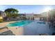 Inviting community pool and spa area with lounge chairs at 5998 N 78Th St # 116, Scottsdale, AZ 85250