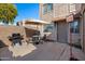 Private patio with seating, grill, and basketball hoop at 600 S Dobson Rd # 205, Mesa, AZ 85202