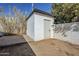 Backyard features a storage shed and a block wall at 7519 N 23Rd Ave, Phoenix, AZ 85021