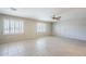 Spacious living room featuring tile floors and ceiling fan at 7519 N 23Rd Ave, Phoenix, AZ 85021