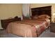 Bedroom with double bed, wood furniture, and carpet at 7807 E Main St # Cc-70, Mesa, AZ 85207