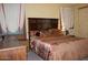 Spacious bedroom with a double bed and wood furniture at 7807 E Main St # Cc-70, Mesa, AZ 85207
