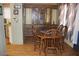 Dining room with wood table and chairs, built-in hutch at 7807 E Main St # Cc-70, Mesa, AZ 85207