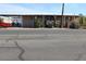 Tan mobile home with carport and mature landscaping at 7807 E Main St # Cc-70, Mesa, AZ 85207