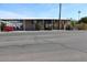 Tan mobile home with carport and mature landscaping at 7807 E Main St # Cc-70, Mesa, AZ 85207