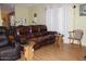 Living room boasts comfortable seating and wood flooring at 7807 E Main St # Cc-70, Mesa, AZ 85207