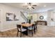 Open concept dining area with a live edge table and modern chairs at 1470 E Cullumber St, Gilbert, AZ 85234