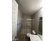 Clean bathroom with a shower/tub combo and updated vanity at 14727 W Pasadena Ave, Litchfield Park, AZ 85340