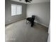 Simple bedroom with carpeted floors and a window at 14727 W Pasadena Ave, Litchfield Park, AZ 85340