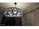 Elegant chandelier adds a touch of sophistication to the home at 14727 W Pasadena Ave, Litchfield Park, AZ 85340