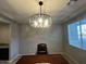 Bright dining room with a large table and comfortable seating at 14727 W Pasadena Ave, Litchfield Park, AZ 85340