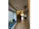 Bright entryway showcasing a curved staircase and a built-in window seat at 14727 W Pasadena Ave, Litchfield Park, AZ 85340