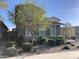 Two-story house with stone accents and landscaping at 14727 W Pasadena Ave, Litchfield Park, AZ 85340