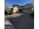 Two-story home with three car garage and paver driveway at 14727 W Pasadena Ave, Litchfield Park, AZ 85340