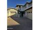Two-story home with attached two-car garage and courtyard entry at 14727 W Pasadena Ave, Litchfield Park, AZ 85340