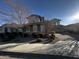 Two-story home with landscaping and a brick driveway at 14727 W Pasadena Ave, Litchfield Park, AZ 85340