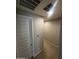 Short hallway with neutral walls and carpeting at 14727 W Pasadena Ave, Litchfield Park, AZ 85340