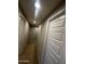 Bright hallway with neutral walls and carpeting at 14727 W Pasadena Ave, Litchfield Park, AZ 85340