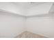 A walk in closet with installed racks at 18409 W Dawn Dr, Surprise, AZ 85374
