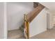 Stairway with carpeted steps and wooden handrail at 18409 W Dawn Dr, Surprise, AZ 85374