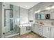 Elegant bathroom with a soaking tub, walk-in shower, and double vanity at 1873 W Dion Dr, Anthem, AZ 85086