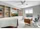 Spacious home office with built-in shelving and a large window at 1873 W Dion Dr, Anthem, AZ 85086