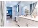 Bright bathroom with double vanity and view of bedroom at 22432 W Kimberly Dr, Buckeye, AZ 85326