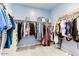 Large walk-in closet with ample hanging space at 22432 W Kimberly Dr, Buckeye, AZ 85326