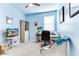 Bright home office features built-in shelving and comfortable seating at 22432 W Kimberly Dr, Buckeye, AZ 85326