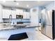 Kitchen boasts granite countertops and stainless steel appliances at 22432 W Kimberly Dr, Buckeye, AZ 85326