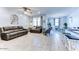 Open living space with view into dining area and kitchen at 22432 W Kimberly Dr, Buckeye, AZ 85326