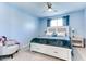 Main bedroom with king-size bed and ensuite bathroom at 22432 W Kimberly Dr, Buckeye, AZ 85326