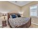 Spacious bedroom with a king-size bed and ensuite bathroom at 32159 N 127Th Dr, Peoria, AZ 85383