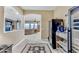 Inviting entryway with wine storage and views into the living area at 32159 N 127Th Dr, Peoria, AZ 85383