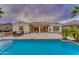 Beautiful home with a large patio, pool, and spacious backyard at 32159 N 127Th Dr, Peoria, AZ 85383