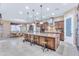 Large kitchen island with granite countertop and ample cabinet space at 32159 N 127Th Dr, Peoria, AZ 85383