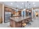Modern kitchen with stainless steel appliances and a large island at 32159 N 127Th Dr, Peoria, AZ 85383