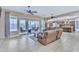 Spacious living room with open floor plan and access to backyard at 32159 N 127Th Dr, Peoria, AZ 85383