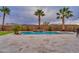 Stunning pool and patio with water feature and mountain views at 32159 N 127Th Dr, Peoria, AZ 85383