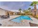 Expansive pool and patio perfect for outdoor relaxation and entertaining at 32159 N 127Th Dr, Peoria, AZ 85383