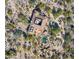 Aerial view of a luxurious home with a pool and desert landscaping at 35035 N Whileaway Rd, Carefree, AZ 85377