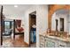 Vanity with granite countertop and access to bedroom at 35035 N Whileaway Rd, Carefree, AZ 85377