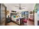 Bedroom with rustic wooden bed frame and colorful decor at 35035 N Whileaway Rd, Carefree, AZ 85377