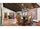 Elegant dining room with wood floors and chandelier at 35035 N Whileaway Rd, Carefree, AZ 85377