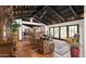 Spacious living area with high ceilings, fireplace, and tiled floors at 35035 N Whileaway Rd, Carefree, AZ 85377