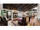 Living room with fireplace and access to backyard at 35035 N Whileaway Rd, Carefree, AZ 85377