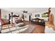 Main bedroom with four poster bed and sitting area at 35035 N Whileaway Rd, Carefree, AZ 85377